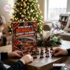 Front view of a Cincinnati Bengals NFL Advent Calendar box with miniature player figures on a wooden table near a Christmas tree.