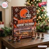 Front view of Cleveland Browns NFL Advent Calendar box with mini figurines on a wooden table.