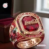 Closeup of Coca-Cola 140th Anniversary 1886 - 2026 Ring featuring a large red gem, bottle relief, and gold lettering.