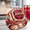 Closeup of Coca-Cola 140th Anniversary 1886 - 2026 Ring featuring a large red gem, bottle graphic, and gold lettering.