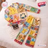 Flat lay of the Cute Pokémon Patchwork Pajama Set with multi-colored character panels on a white bed.