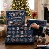 Front view of a Dallas Cowboys Christmas Advent Calendar with open compartments revealing metal ornaments.