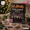 Front view of Def Leppard 2027 Advent Calendar box with assorted band-themed metal pins arranged on a wooden surface.