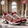 Side view of Delta Sigma Theta Elephant Air Max Plus Sneaker featuring red floral and elephant graphics.