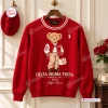 Front view of a red sweatshirt featuring a teddy bear graphic and Delta Sigma Theta lettering.