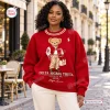 Front view of a woman wearing a red Delta Sigma Theta Polo Bear sweatshirt outdoors.