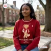 Front view of a woman wearing a red sweatshirt with a collegiate bear graphic and Delta Sigma Theta text.