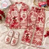 Flat lay of red and white Delta Sigma Theta Satin Pajama Set with matching slippers and floral print.