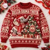 Front view of a red Delta Sigma Theta ugly Christmas sweater featuring an elephant and a decorated holiday tree.
