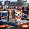 Front view of Denver Broncos Miles Mascot Vinyl Figure beside its box on a table outdoors.