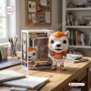 Front view of Denver Broncos Miles Mascot Vinyl Figure standing next to its branded box on a wooden desk.