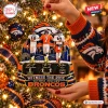 Close-up of a decorative Denver Broncos Peyton Manning Elway Nix ornament hanging on a Christmas tree.