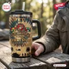 Closeup of the Desert Storm 35th Anniversary Stanley Tumbler on a wooden table outdoors.