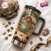 Front view of Desert Storm 35th Anniversary Stanley Tumbler with military graphics on fur background.