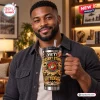 Man holding a Desert Storm Marine Corps YETI Tumbler Cup with graphic print.