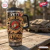 Front view of Desert Storm Marine Corps YETI Tumbler Cup resting on a wooden table.