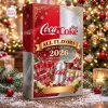 Front view of the Diet Coke & Coca-Cola All Flavors Advent Calendar 2026 set against a snowy Christmas tree background.