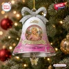 Front view of the Dolly Parton 1946-2026 Memorial Bell Christmas Ornament hanging on a tree.