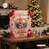 Front view of the Dolly Parton 80th Anniversary Advent Calendar 2026 on a wooden table with miniature figurines.