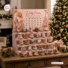 Front view of a pink Dolly Parton Christmas Advent Calendar with miniature figurines displayed on tiered shelves.