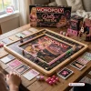 Top down view of Dolly Parton Collector Edition Monopoly Board Game set up on a wooden table.