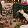 Front view of Donkeys Bad Decisions Advent Calendar with a hand opening a drawer.