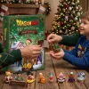 Front view of the Dragon Ball 40th Anniversary Z-Fighters 2026 Advent Calendar being opened with figures on a table.
