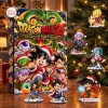 Front view of a Dragon Ball Z Advent Calendar Blind Box next to holiday figures on a table.