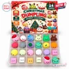 Front view of an open Christmas dumpling squishy toy advent calendar revealing twenty-four compartments with colorful figures.