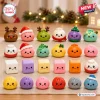Front view of a Dumpling Squishy Toy Advent Calendar collection featuring various cute character figures on a surface.