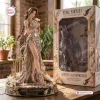 Front view of the Final Fantasy Aerith Gainsborough 40th Anniversary Vinyl Figure standing next to its box.