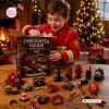 A boy in firefighter costume opening the Firefighter Gear Advent Calendar 2026 with miniature figurines displayed.