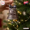 Close-up view of the Robby The Robot 70th Anniversary Bell Ornament hanging on a Christmas tree.