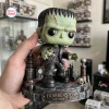 Closeup of a Frankenstein Monster Halloween diorama figure held in hand.
