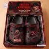 Top view of Freddy Krueger horror slip-on crocs clogs resting inside a matching themed box.