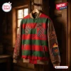 Front view of Freddy Krueger Nightmare Varsity Jacket hanging on wooden wall.