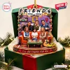 Front view of the Friends 1994 Resin Christmas Ornament featuring six figures on an orange couch.