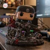 Front view of Marcus Fenix vinyl figure standing on a detailed battlefield base with a rifle.
