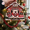 Close-up of a Georgia Bulldogs 135th Anniversary Christmas Ornament hanging on a tree.