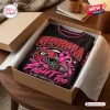 Top view of a Georgia Bulldogs breast cancer awareness shirt inside a gift box.