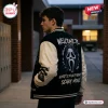 Back view of a person wearing a Ghostface Woodsboro Scary Movie Varsity Jacket in a hallway.