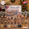 Front view of the Gilmore Girls Advent Calendar 2026 box surrounded by various figurines and themed mini items.