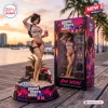 Front view of Grand Theft Auto VI Ada Wong Collector Figure standing on a beach themed base with its packaging box.