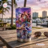 Front view of a Grand Theft Auto VI Vice City tumbler cup featuring character artwork on an outdoor wooden table.