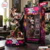 Front view of the Grand Theft Auto VI x Tifa Lockhart Vinyl Figure standing next to its branded packaging box on a wooden desk.