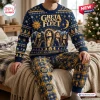 Front view of a person wearing a Greta Van Fleet Christmas sweater and matching patterned jogger pants.