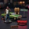 Closeup of miniature figures including a man in a tank top, a green car, a jetpack, a Grove Street sign, and a Wasted sign.