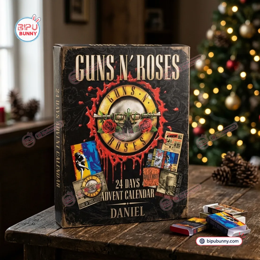 Book-style rigid paperboard Guns N Roses Advent Calendar standing upright beside individual daily countdown boxes