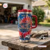 Front view of Honda 78th Anniversary 1948-2026 handle tumbler on wooden bench.