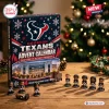 Front view of Houston Texans NFL Advent Calendar box with mini figurines displayed on wooden table.